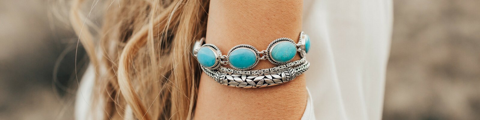 925 Sterling Silver Jewelry on woman's arm