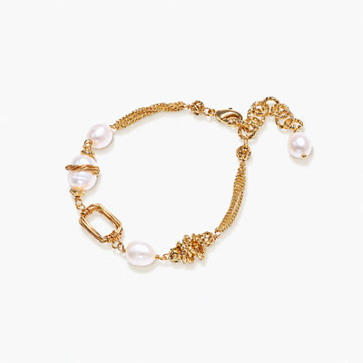 14K gold plated bracelet with freshwater pearls, filigree details, and mixed geometric elements on white background.