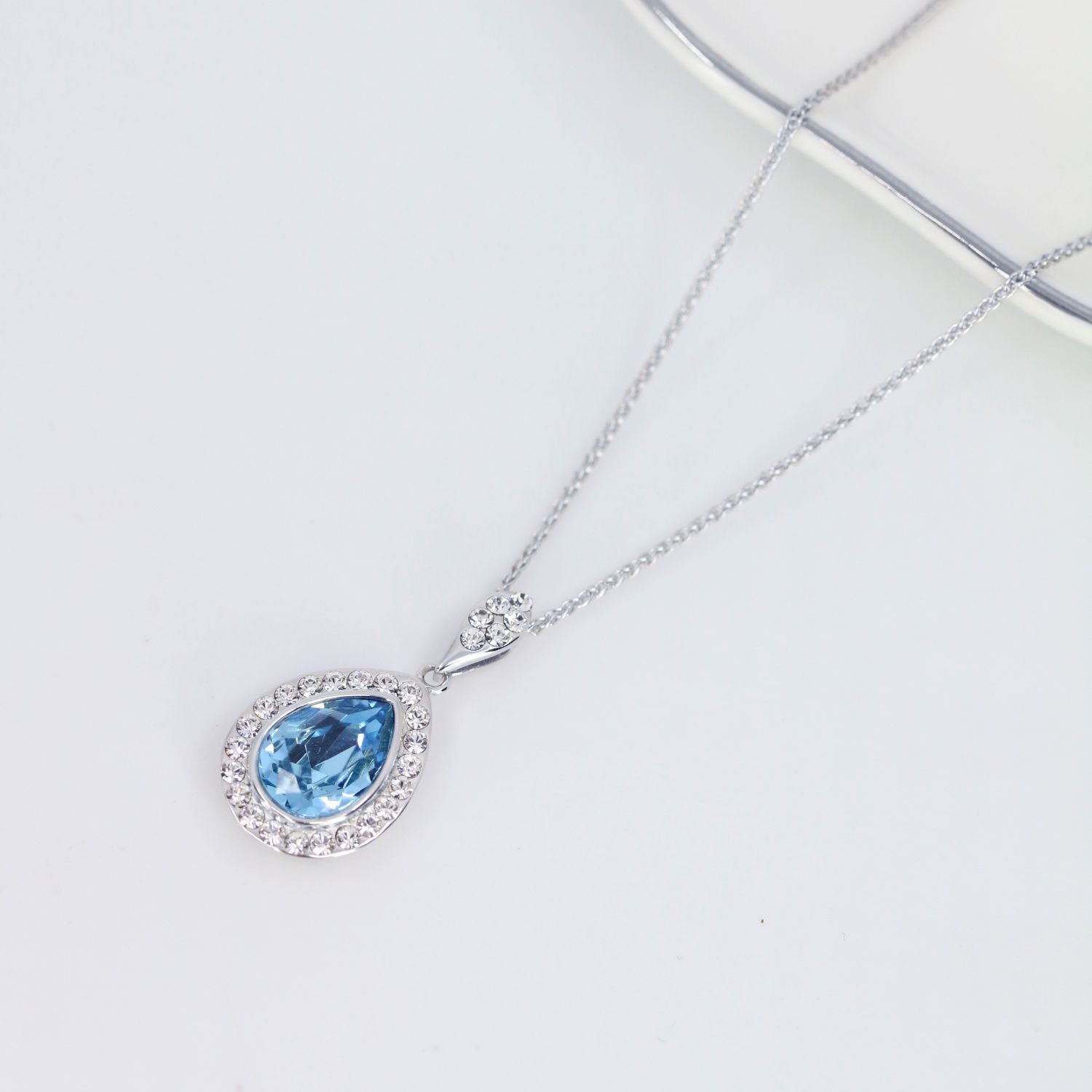 Swarovski blue on sale teardrop necklace
